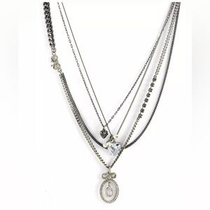 Silver layered Juicy Couture necklace with heart diamond